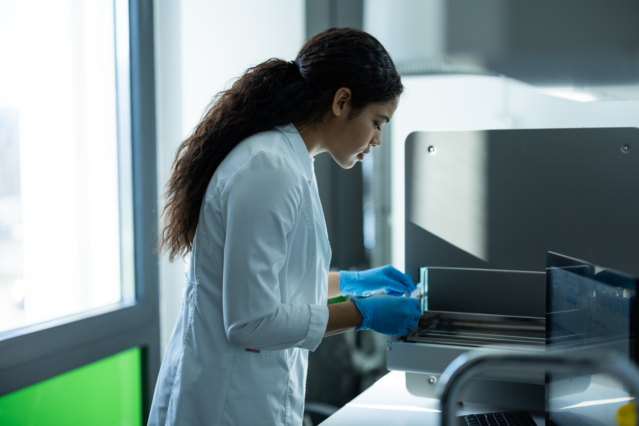 A Forensic Technician Working in a Lab..jpg